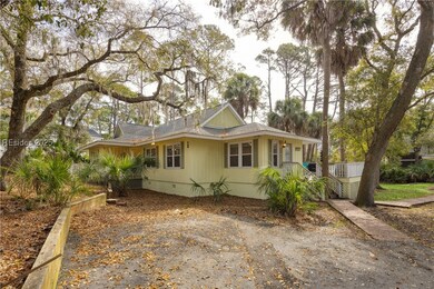 Front view of home with large & spacious driveway