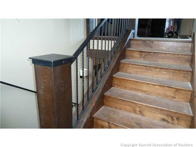Other. Beautiful wood floors and stairs with detai
