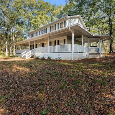 View of front of property featuring crawl space and a porch