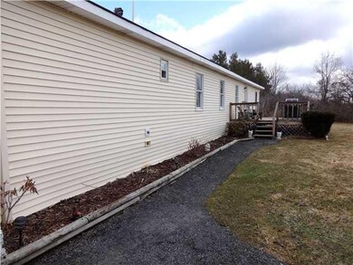 Exterior Front Front walk to deck and front door