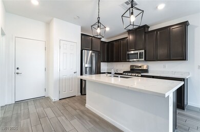 Kitchen with appliances with stainless steel finis