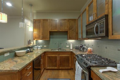 Beautiful kitchen finishout with gas range.