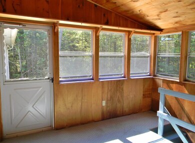 Mudroom entrance from driveway, with...