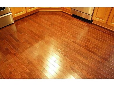 Kitchen. GLISTENING FLOORING THROUGHOUT THE ENTRYW