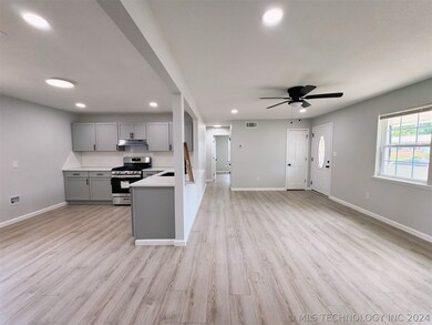 open concept living + dining