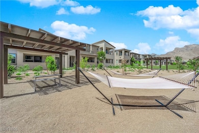 Surrounding community with a pergola and a residential view