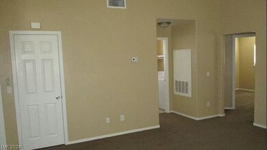 Living room view to kitchen