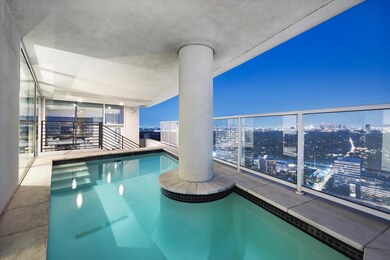 Elegant poolside oasis with panoramic city views,