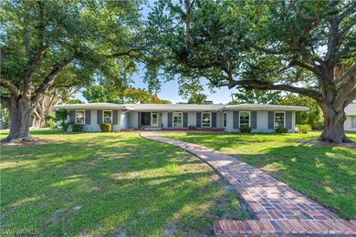 Ranch-style home featuring a front yard