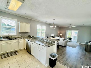 Kitchen with light tile patterned floors, ornament