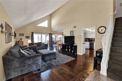 Updated home with newer windows, nice flooring, stunning kitchen and vaulted ceilings