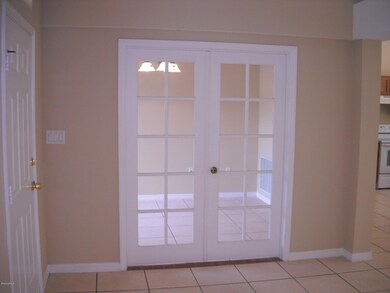 French doors to formal dining room