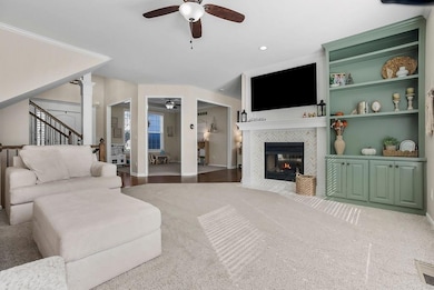 Two living rooms give you the best of both worlds. Updated built in cabinets with a sage green warms this room along with the fireplace.