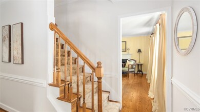 Center hall with hardwood floors