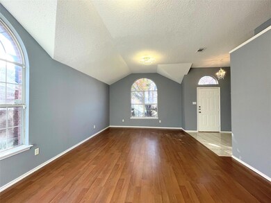 Entryway with hardwood / wood-style flooring, an i