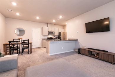 Kitchen featuring stainless steel appliances, carp