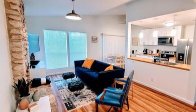 Living area featuring light wood-style floors and