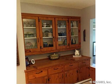 Breakfast Room. Glass doors on upper cabinets. Mor