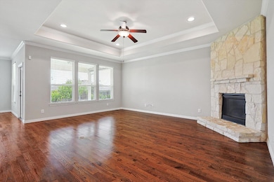 Living room with crown molding, dark hardwood / wo