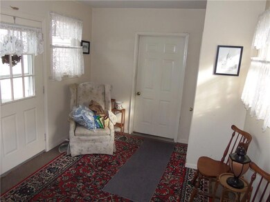 SUN PORCH CONNECTION TO ONE CAR GARAGE