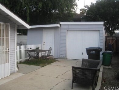 1-car garage and storage shed for front unit.