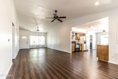 Opens to kitchen