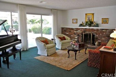 Spacious living room with a fireplace and a view!
