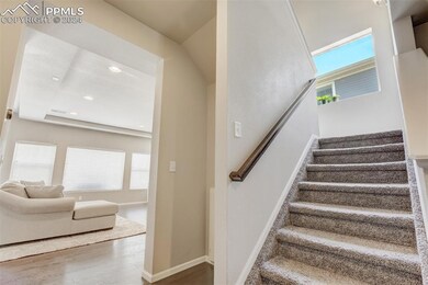 Standing at entry way with stairs off to the left