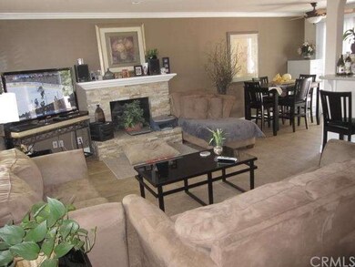 Living room open to dining area and breakfast bar