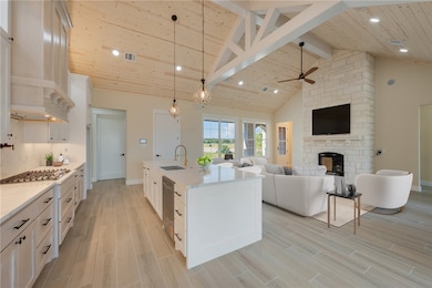 Kitchen with appliances with stainless steel finis