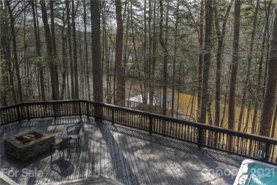 Rear Deck complete with firepit and hot tub!