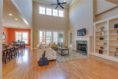 High ceilings, built-ins, fireplace, hardwood floors!
