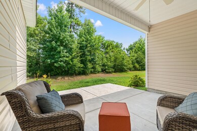 View of patio featuring ceiling fan