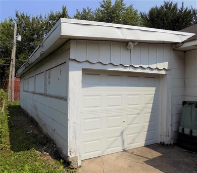 Long Tandem Garage holds 2 cars.
