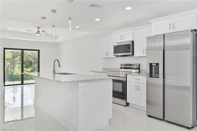 4709-4711 27th St SW, Lehigh Acres, FL 33973 - photo 5