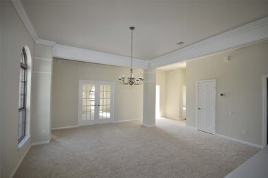 View across Formal Dining to the French Doors of the study.