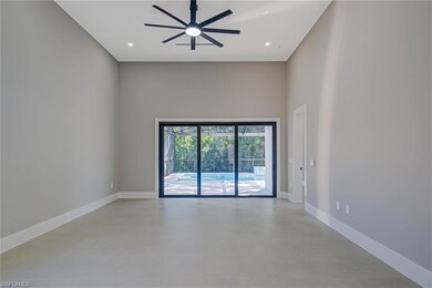 Spare room with ceiling fan