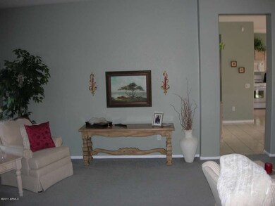 Another view of living room to kitchen