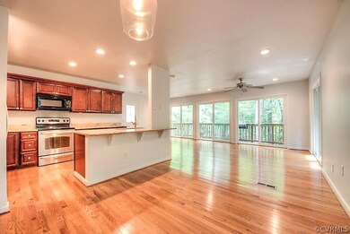Kitchen, dining and view into the woodland