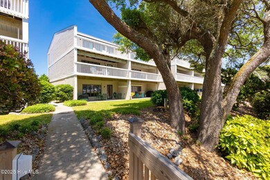 Back and walkway to pool and beach