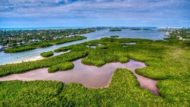 Stroll along the path through the natural mangroves to the covered gazebo on the Intracoastal Waterway. Throw in a line or relax and read your favorite novel while watching the boats go by.
