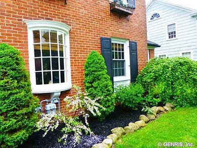 Exterior Front. Landscaped area in front of house.