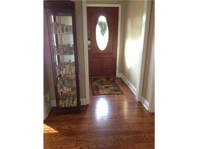 Entry/Foyer. Hardwood flooring and 5 1/4