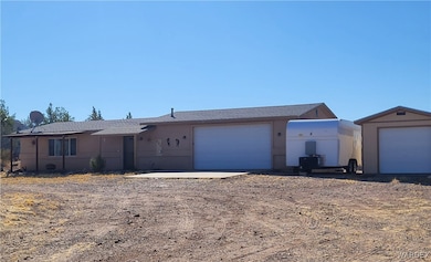 Ranch-style house featuring a garage