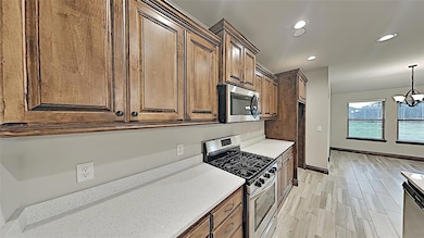 Kitchen featuring stainless steel appliances, rece