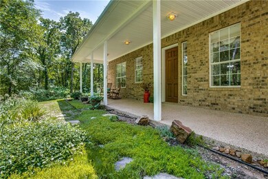 Great front porch runs the entire length of the ho