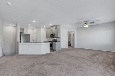 Unfurnished living room featuring light colored ca