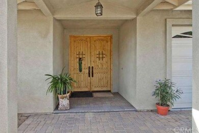 Welcme your guests thru this beautiful Spanish sty