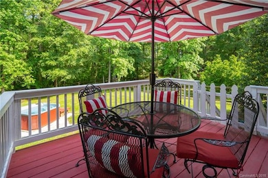 Well kept and refinished deck looking out to priva