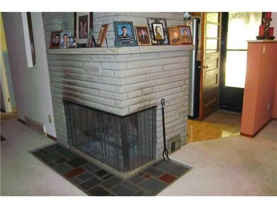 Living Room. The fireplace in the living room face